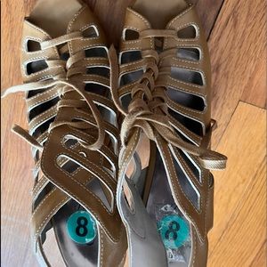 Pair of Guess sandals.  Too high for me but very cute.